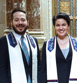 Freedman and Maderer pose inside their synagogue